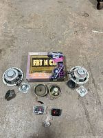 Lot overview showing speakers, fog light box, terminals, wiring