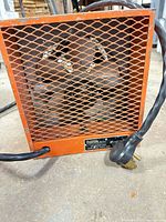 Front view of Chromalox heater showing mesh grille, power cord and plug