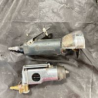 Both pneumatic tools side by side showing overall condition and fittings