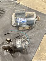 Overall view showing Doerr motor with pulley and Bodine speed reducer motor side by side