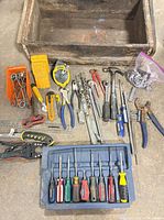 All tools laid out with wooden crate and bins