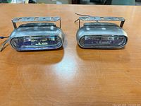 front view of both oval metal fog lights