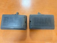 two plastic lens covers embossed BAJA
