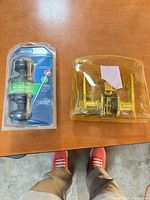 Packaged Schlage knob set and packaged lever set