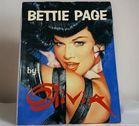 Front cover of hardcover book titled Bettie Page by Olivia