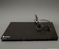 Top view of Sony BDP-S270 player with attached power cord