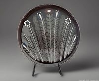 Front of plate showing full floral design and dotted rim