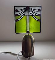 Lamp illuminated showing stained glass design