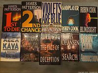 All twelve books laid out in three rows for complete view