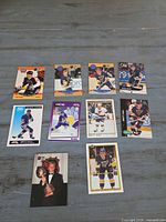 All eleven Brett Hull hockey trading cards laid out for condition and content reference