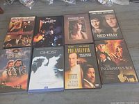 All eight DVD cases front covers visible in grid