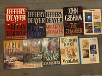All 10 visible hardcover books laid out in two rows