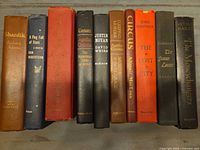 All ten cloth-bound hardcovers standing spine out