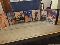 Front view of all seven DVD cases lined up