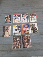 Front view of all 11 Mario Lemieux cards in sleeves