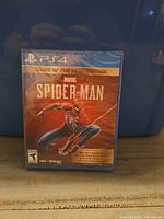 Front view of sealed PS4 Marvel's Spider-Man Game of the Year Edition case