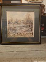 Full view of framed watercolor landscape