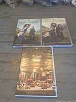 Three Outlander DVD cases front covers