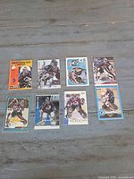 Fronts of eight Patrick Roy Colorado Avalanche cards laid out in two rows.
