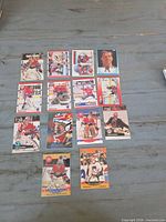 Front view of all sixteen Patrick Roy 1990s trading cards arranged in four-by-four grid