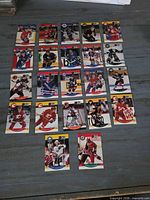 Front view of all hockey cards laid out showing player images and fronts