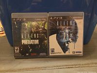 Front view of both PS3 game cases