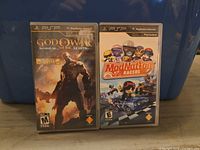 Front view of both PSP game cases