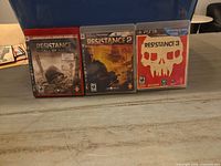 Front cover view of all three PS3 cases