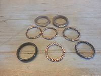All nine bangles laid out in three rows