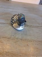 Top view of carved wooden loon figurine