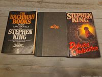 Front covers of The Bachman Books, Rose Madder, and Dolores Claiborne