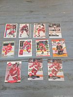 Front view of all 12 Steve Yzerman cards in sleeves