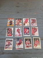 Fronts of twelve Steve Yzerman Detroit Red Wings trading cards laid out