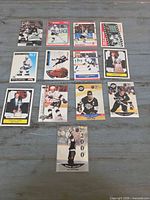 Fronts of 13 Gretzky trading cards laid out