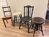Group shot of two chairs and two stools