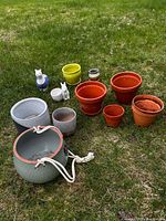 Group shot of all twelve planters on grass