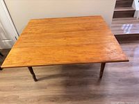 Top view of table with both leaves raised