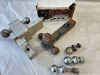 Full lot showing receiver hitch, drawbar and hitch balls