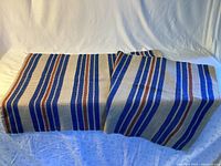 Fabric laid out showing full length stripe pattern