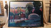Front view showing entire framed landscape painting