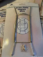 Tripar brass plate display wire 10-14 in package with mounting screws