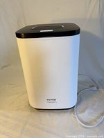 Full exterior view of VEVOR towel warmer bucket with power cord visible