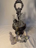 Full view of stand with bottles and loose stoppers