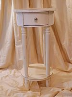 Full view of round accent table front