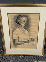 Full view of framed charcoal portrait
