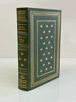 Spine and front cover showing green leather and gilt decoration