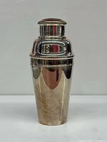 Full view of Asprey silver plated cocktail shaker