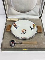 Complete set in box: warming bowl with wood handles, matching spoon, instruction slip
