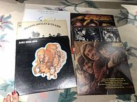 All six LP album covers laid out showing artwork and titles