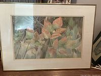 Front view showing painting, mat, and frame